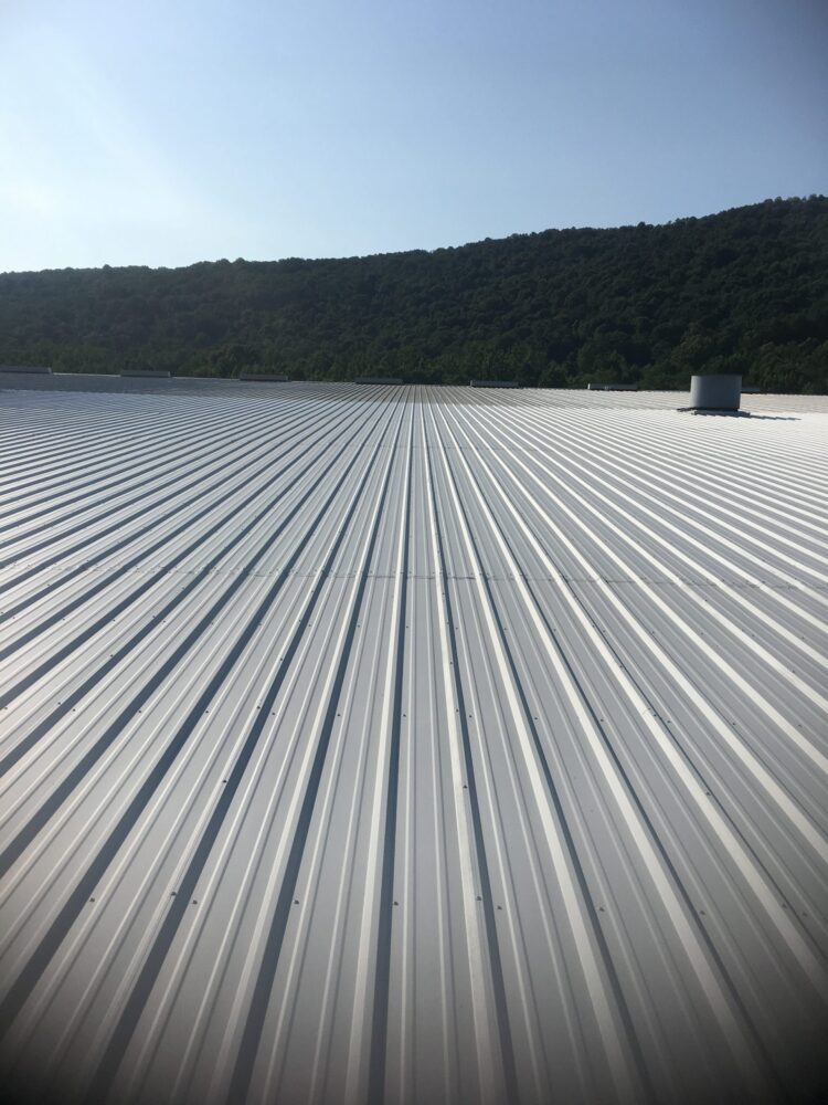 expansive flat white metal roof